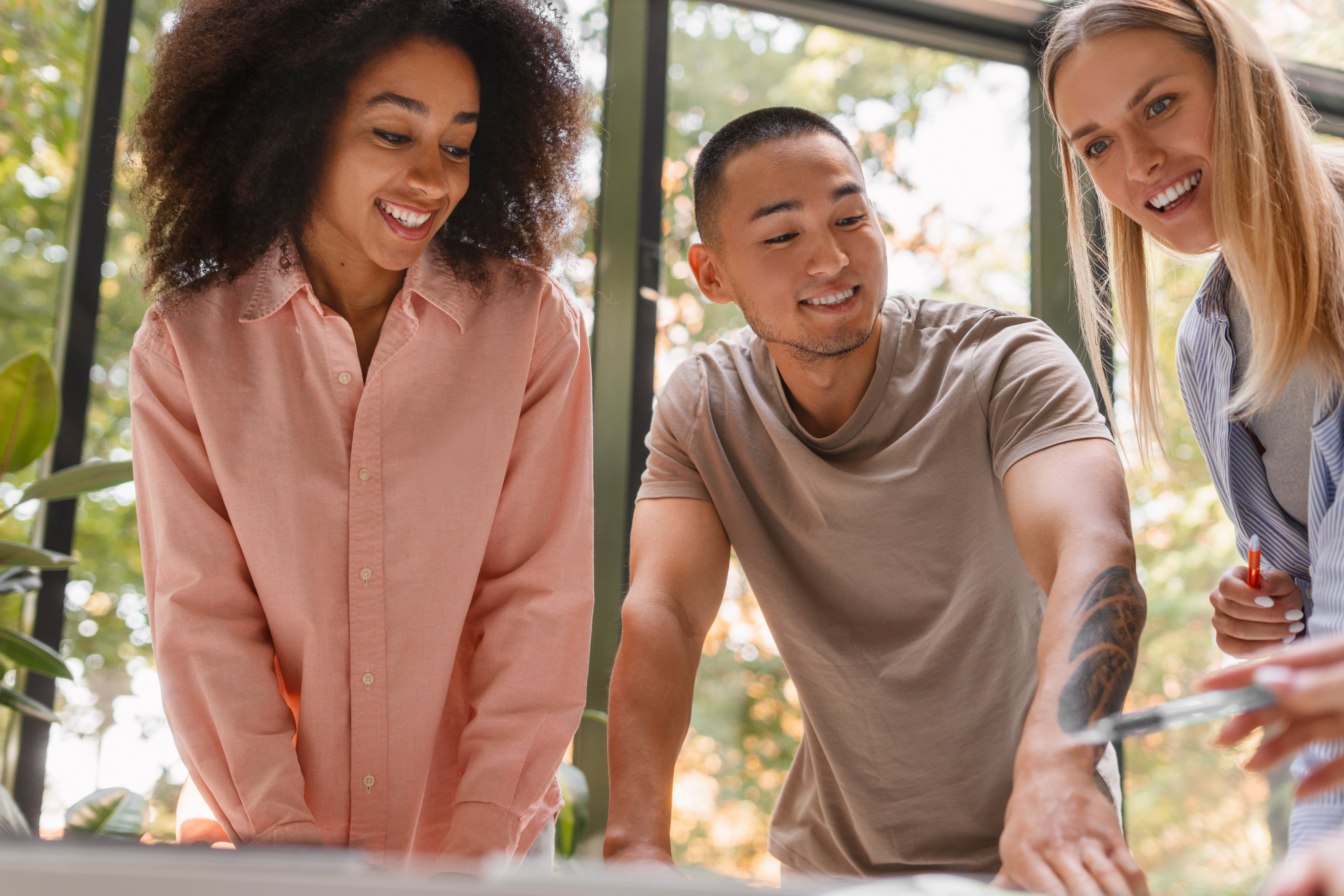 people-working-tech-brand-together