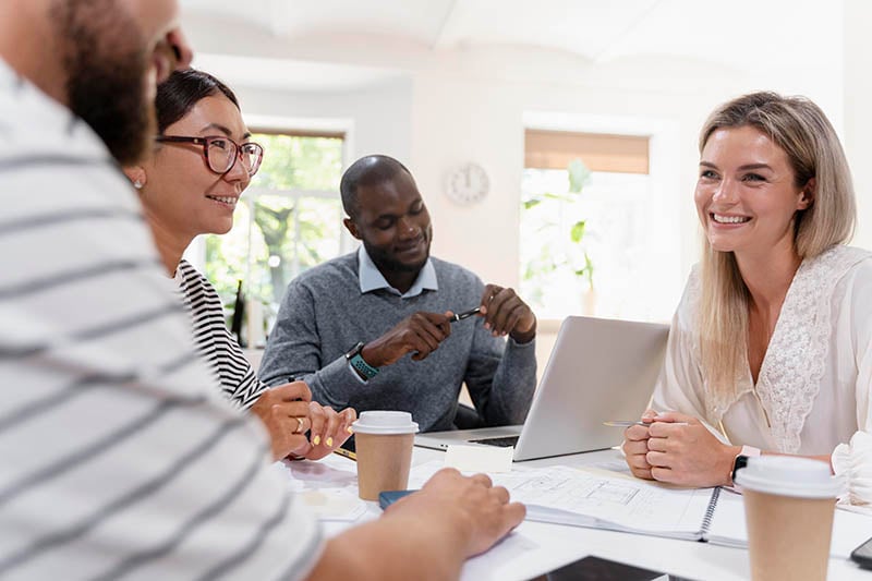 close-up-young-colleagues-having-meeting-2